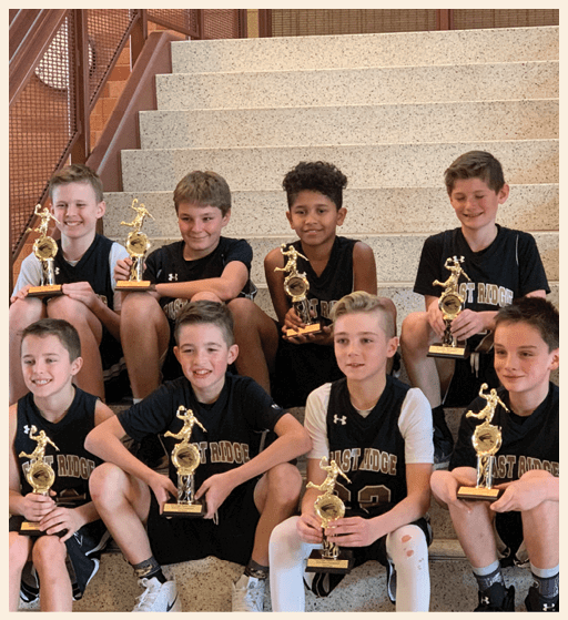 A group of young boys are holding trophies in their hands. AI generated content