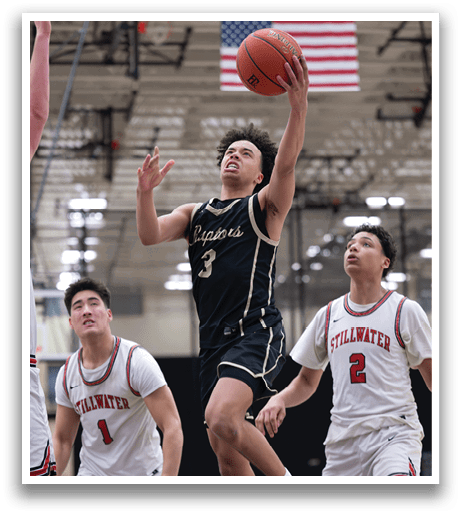 A basketball player jumps in the air to grab the ball. AI generated content