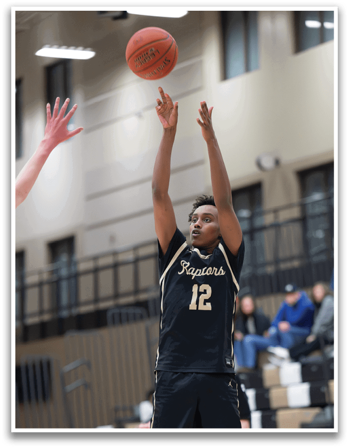 A basketball player in a black and gold jersey is jumping to catch a basketball. AI generated content