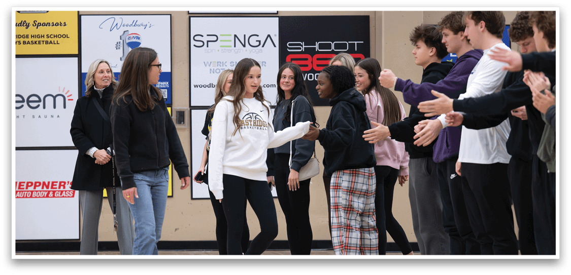 A group of people are standing in a line, shaking hands with a woman. AI generated content