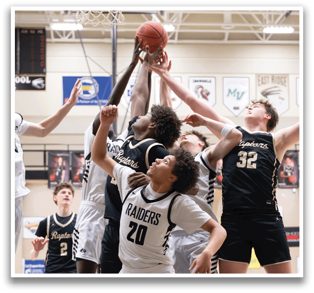 A group of basketball players are playing a game. One player is attempting to block a shot. AI generated content