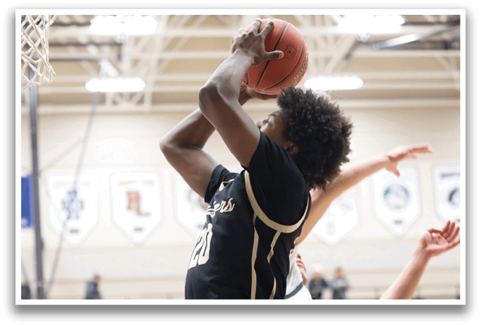 Two basketball players are fighting for the ball. One player is jumping in the air to get the ball while the other player tries to block him. AI generated content