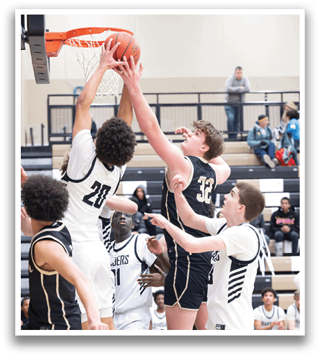 A group of young men playing basketball, with one player attempting to block a shot. AI generated content