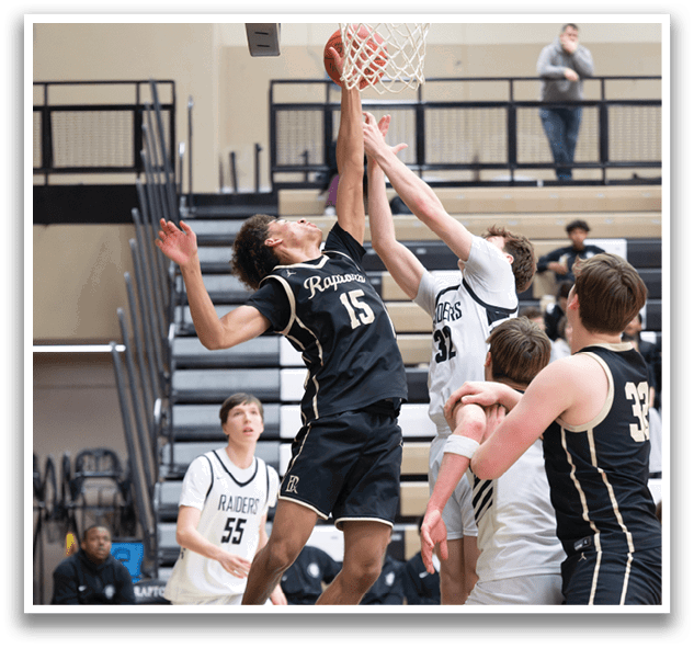 A basketball game is in progress with players on the court. One player is jumping up to hit the basketball, while another player is trying to block him. The basketball is in the air, and the players are all focused on the game. AI generated content