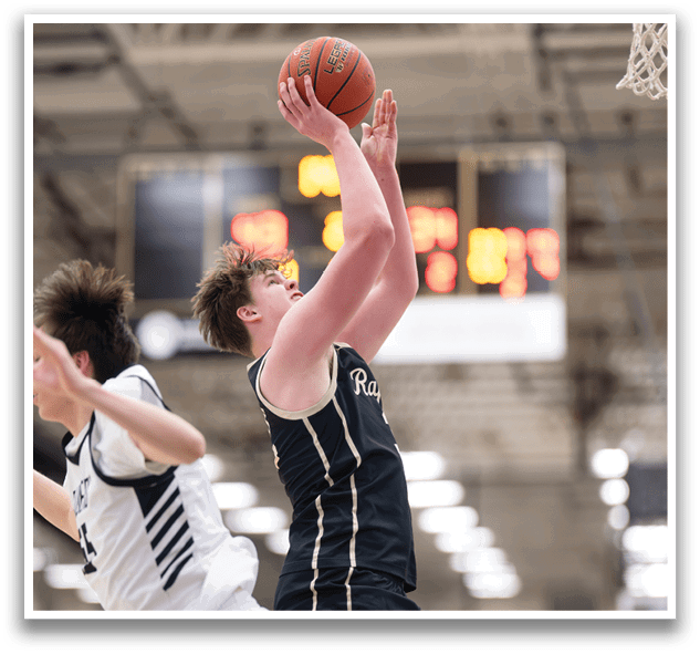 Two basketball players are playing in a game. One player is jumping up to grab the ball while the other player is trying to block the shot. AI generated content