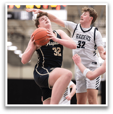 Two men are playing basketball, one of them is trying to block the other's shot. AI generated content