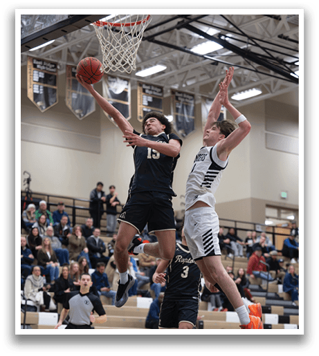 Two basketball players jumping for the ball. AI generated content