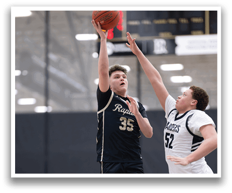 Two basketball players jumping for the ball. AI generated content