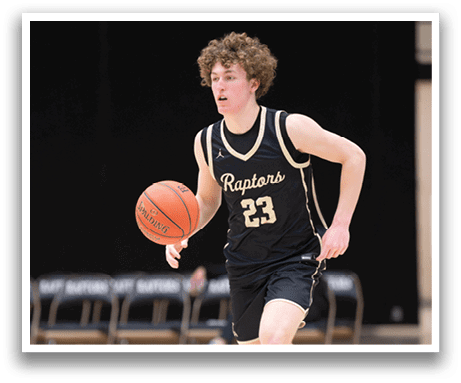 A basketball player wearing a black and gold jersey with the number 23 on it is running with a basketball in his hand. AI generated content