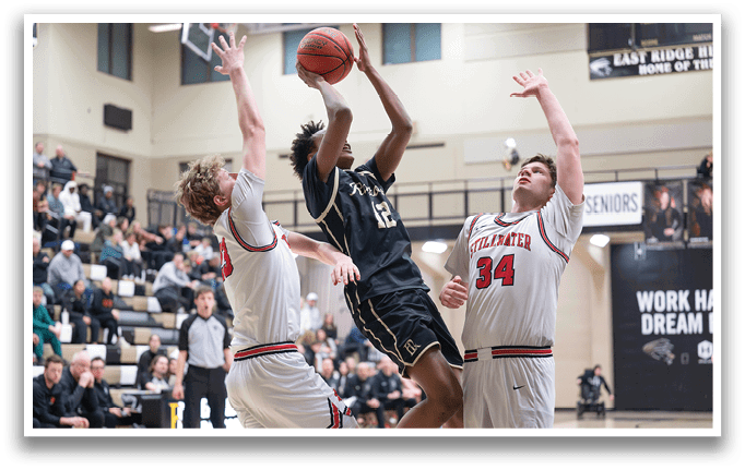 Three basketball players are playing in a game. One player is trying to block a shot, while the other two are trying to get the ball. The players are wearing uniforms and are in the middle of the action. AI generated content