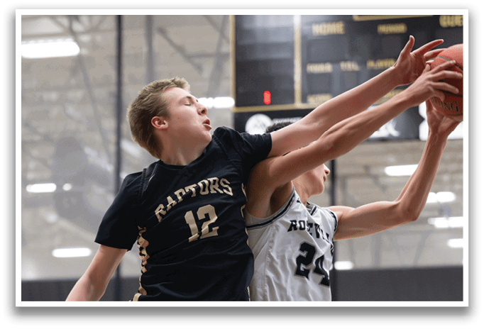 Two basketball players jumping for the ball. AI generated content