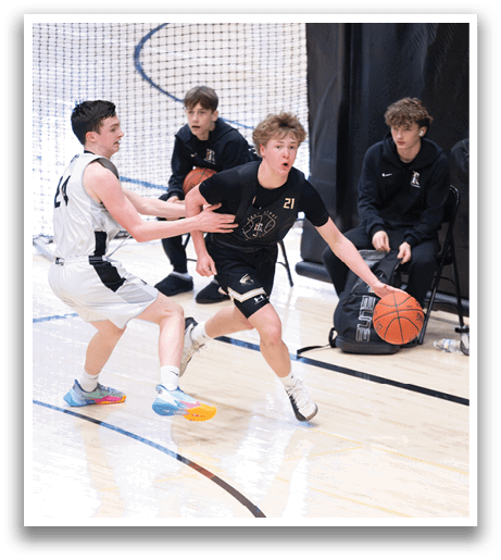 Two boys are playing basketball on a court. One boy is holding the ball while the other boy tries to take it from him. AI generated content
