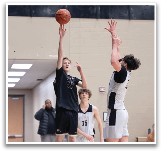 Two basketball players jumping for the ball, one on the left and one on the right. AI generated content