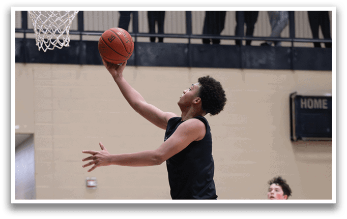 A basketball player is jumping to catch a ball in a gym. AI generated content