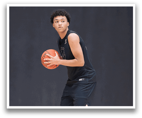 A man holding a basketball in his hands. AI generated content