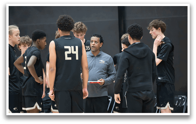 A group of young men are standing around each other on a basketball court. AI generated content
