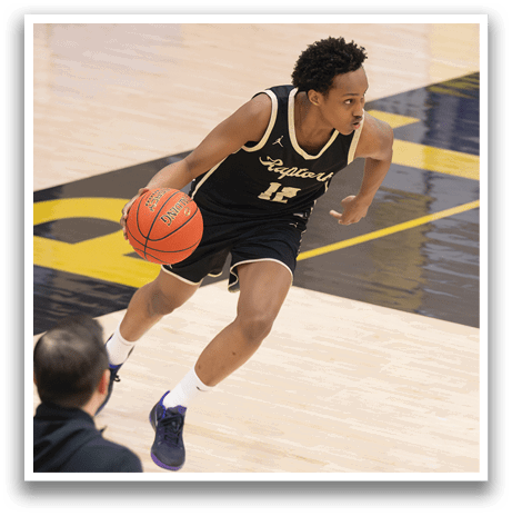 A man in a basketball uniform is running with a basketball in his hand. AI generated content