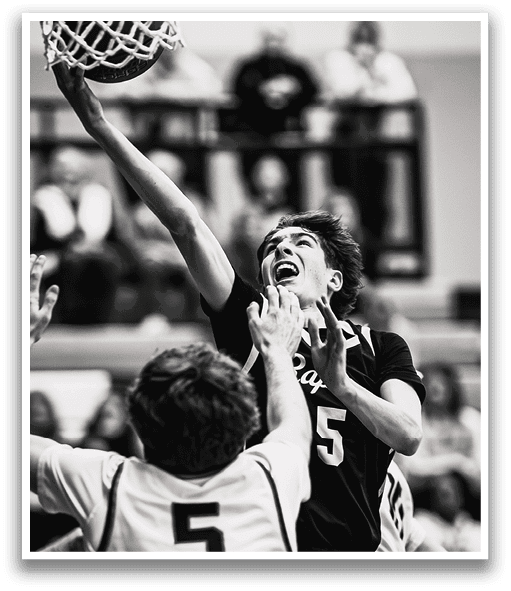 A basketball player leaps to block a shot, while a crowd of people watch. AI generated content