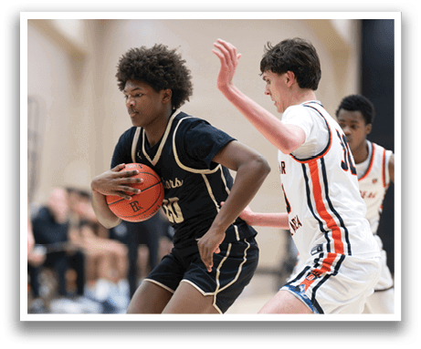 Two basketball players are running on the court, one holding a basketball. AI generated content