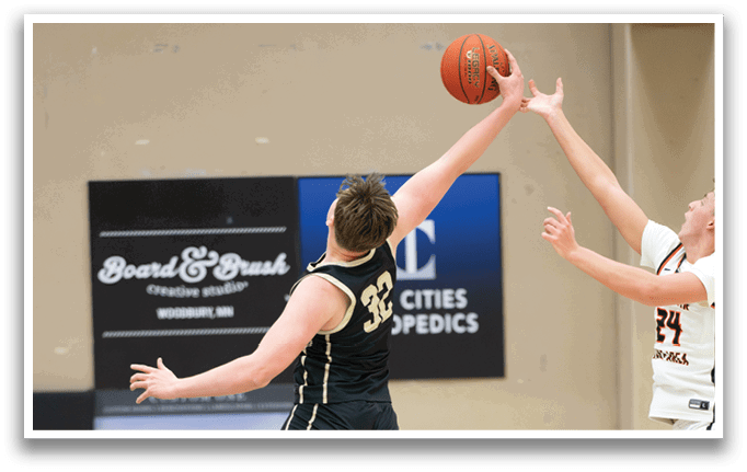 Two basketball players jumping for the ball, one with a white shoe. AI generated content