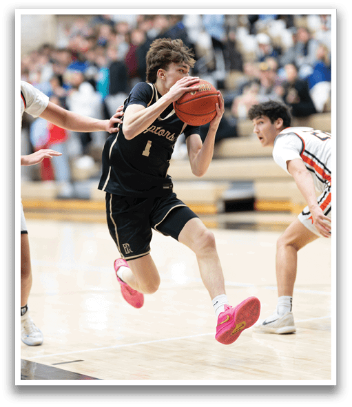 A basketball player wearing a black shirt and pink shoes is running with a basketball in his hands. AI generated content