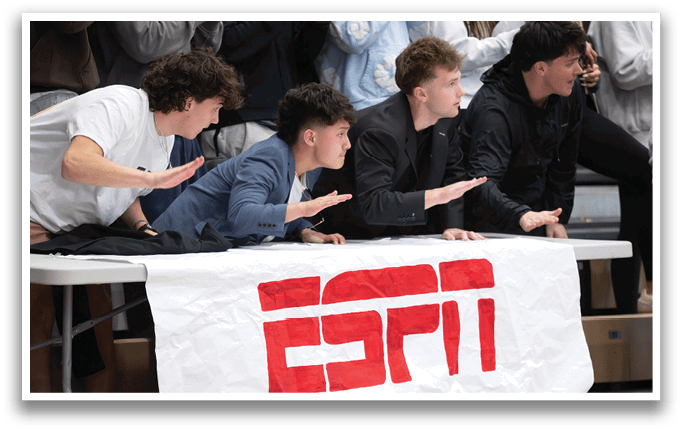 A group of men are sitting around a table with an ESPN banner in front of them. AI generated content