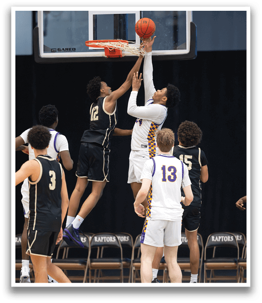 Basketball players jumping for a rebound. AI generated content