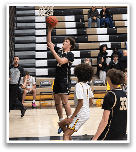 A basketball player is jumping to catch the ball while others watch. AI generated content