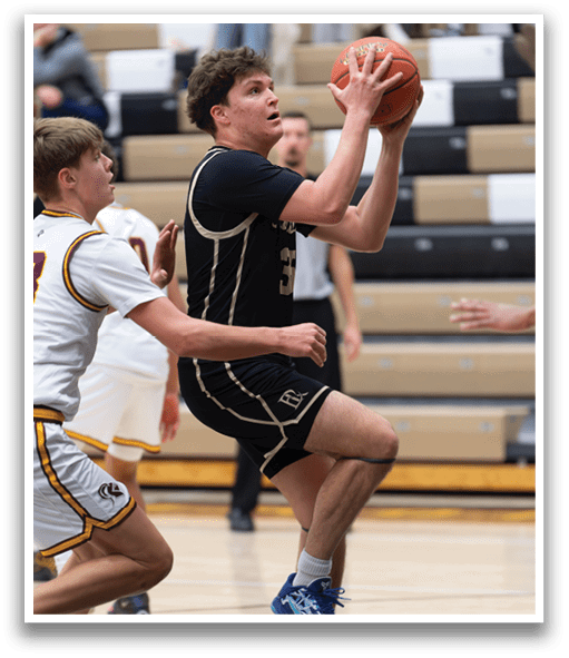 A basketball player in a black and gold uniform is attempting to block a shot. AI generated content