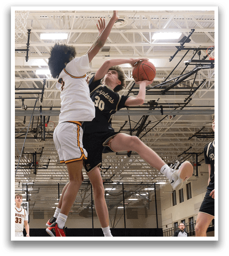 Two basketball players jumping for the ball. AI generated content