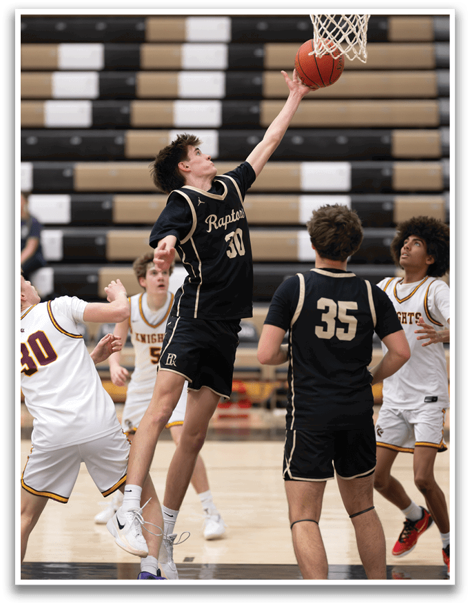 A basketball player leaps to block a shot, while other players look on. AI generated content