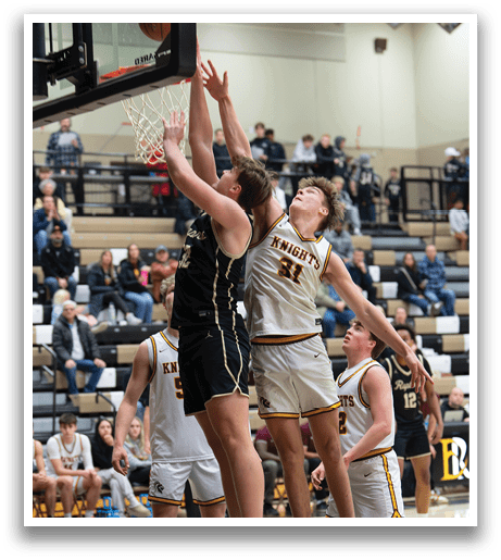 Two basketball players jumping for the ball, one with the ball in hand. AI generated content