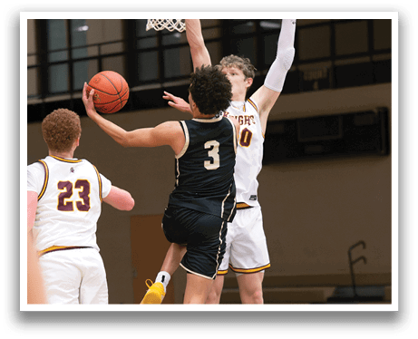 Two basketball players are leaping in the air to reach for the ball. AI generated content