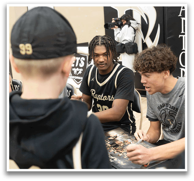 A group of people, including a man signing autographs for fans. AI generated content