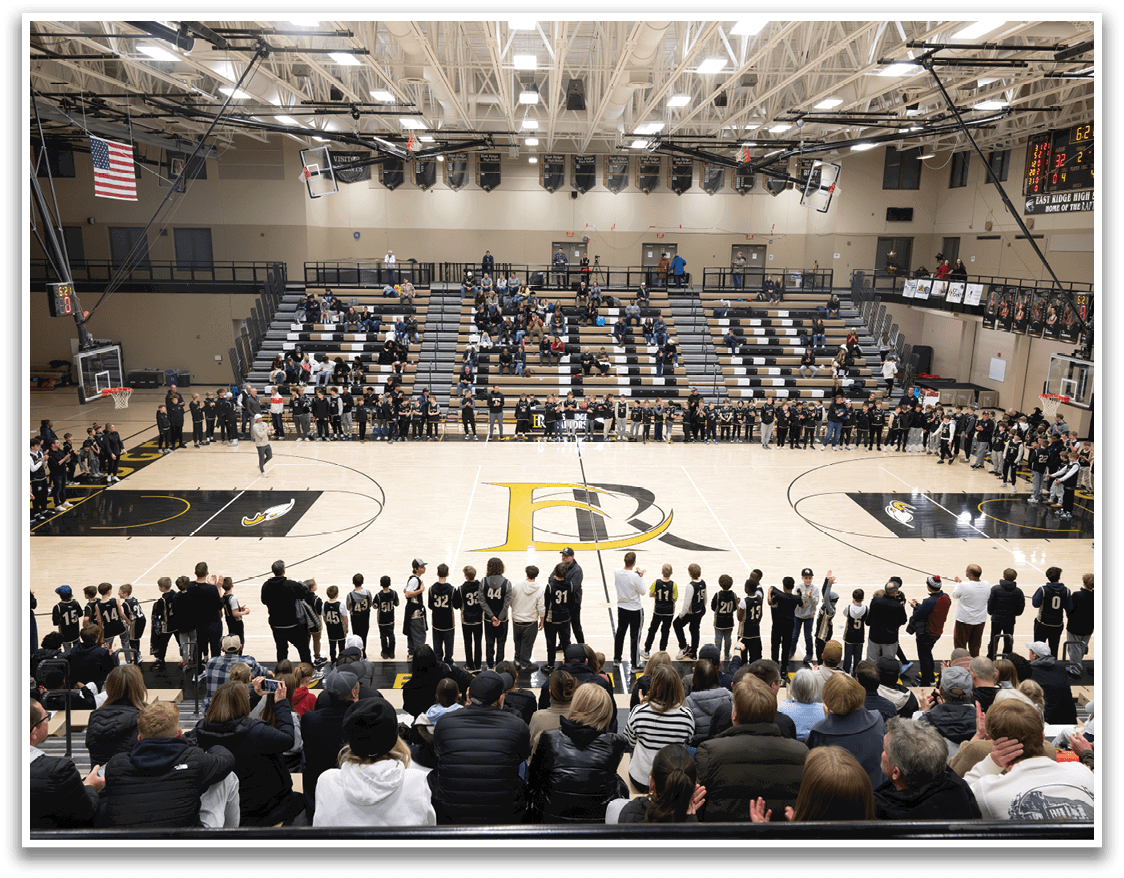 A basketball game is taking place in a crowded stadium. AI generated content