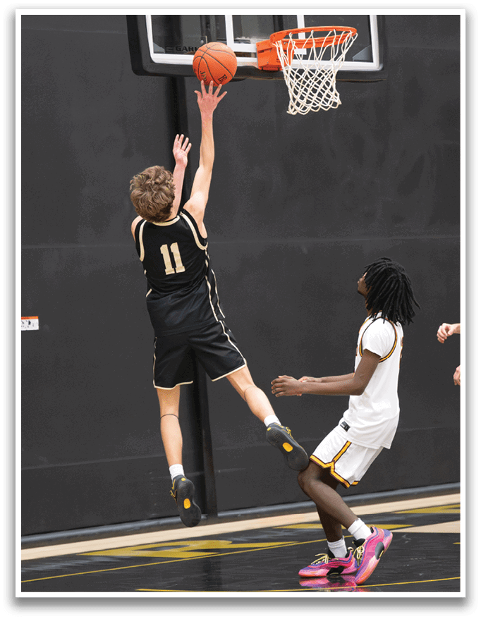 A basketball player leaps in the air to grab the ball. AI generated content