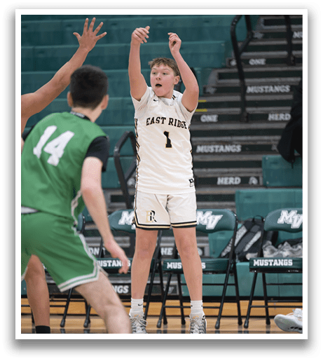 A basketball player wearing a white jersey with the number 14 on it is attempting to block a shot. AI generated content