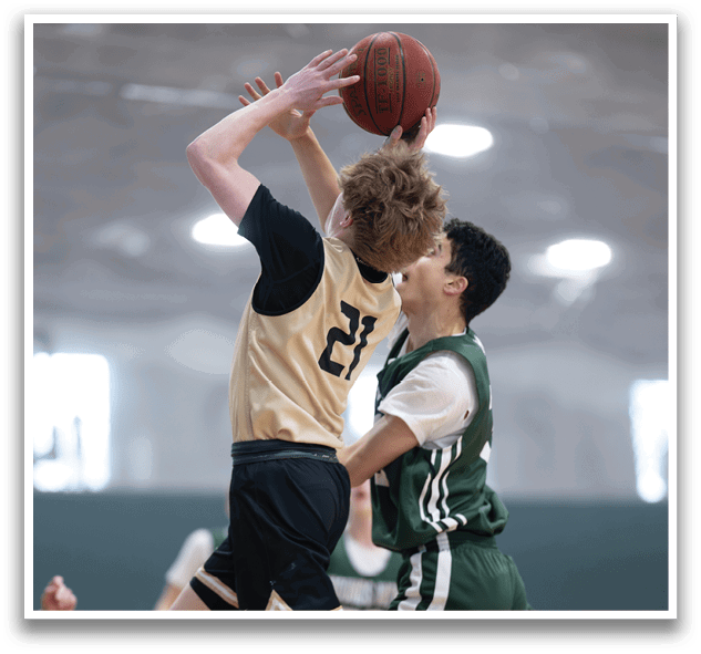 Two basketball players jumping for a ball. AI generated content