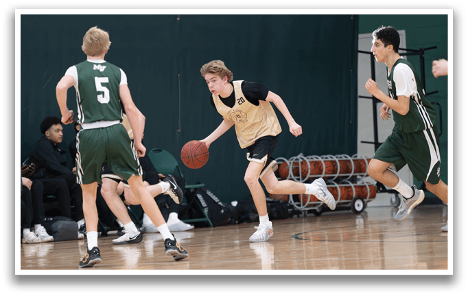 A group of young men playing basketball on a court. AI generated content