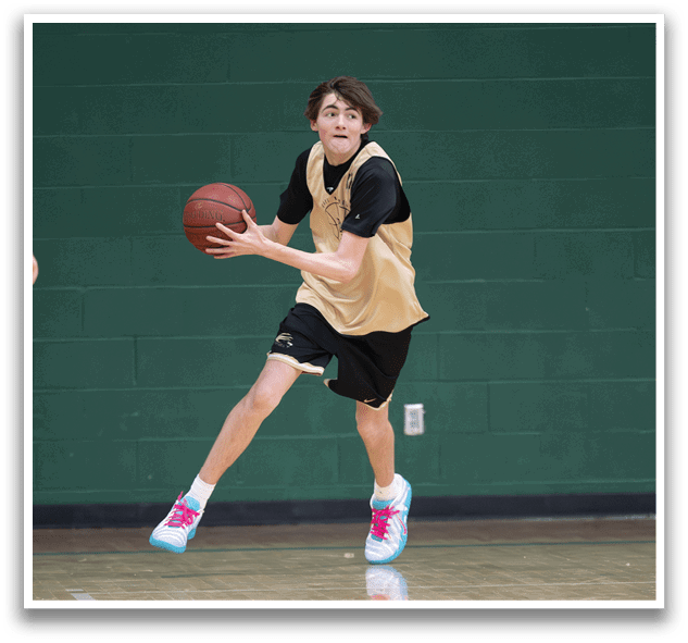 A boy in a basketball uniform is running with a basketball in his hand. AI generated content