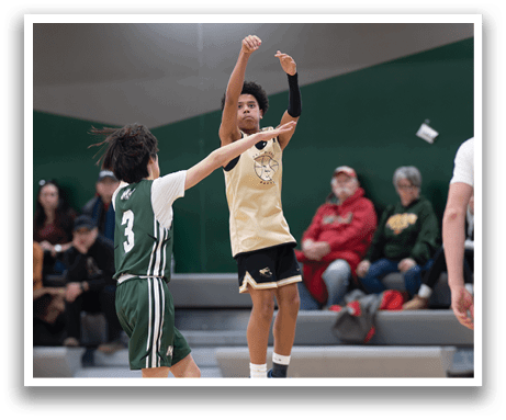 Two basketball players are on the court, one of them jumping to block a shot. AI generated content