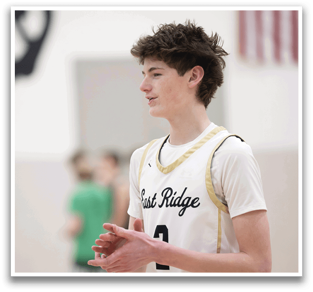 A young man wearing a basketball jersey with the number 2 on it stands on a basketball court. AI generated content