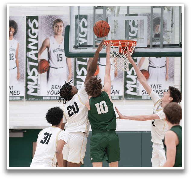 Basketball players in action, one player jumping to block a shot. AI generated content