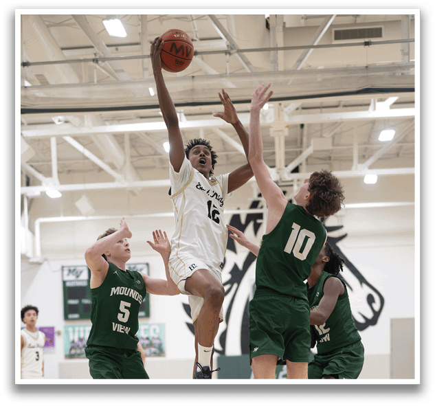 Basketball players on a court, one player is jumping to block a shot. AI generated content