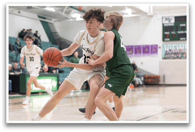 Two basketball players are playing on the court, one holding a basketball and the other trying to block him. AI generated content
