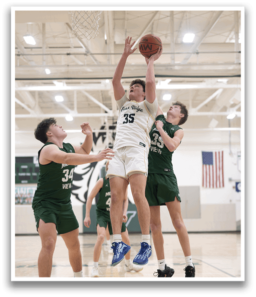 A basketball player jumps to block a shot, while two other players look on. AI generated content