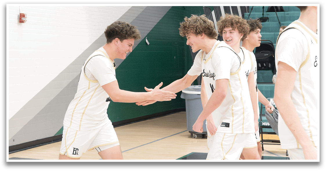 A group of young men are playing basketball, with one player shaking hands with another. AI generated content