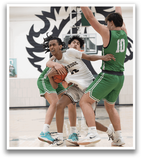 Three basketball players are fighting for the ball on the court. AI generated content