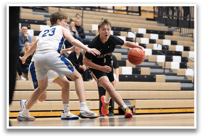 Two basketball players are playing for the ball. One player is wearing a white jersey and the other is wearing a black jersey. AI generated content