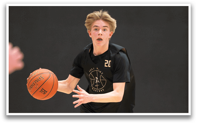 A young man wearing a basketball uniform is running with a basketball in his hand. AI generated content